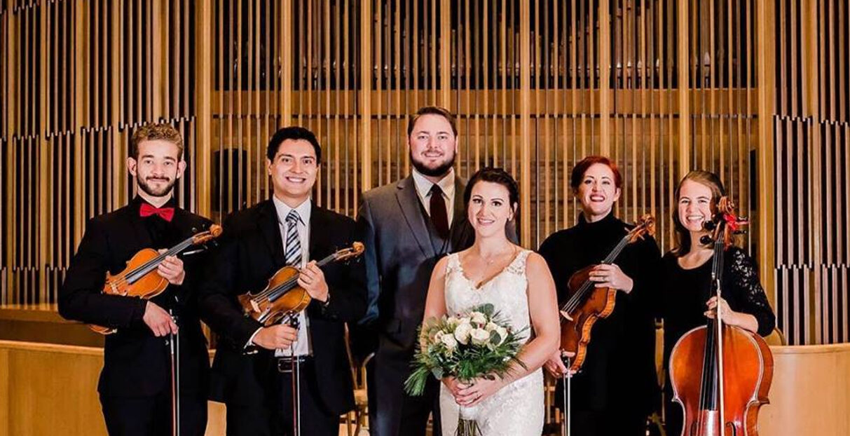 String ensemble performing for a bride